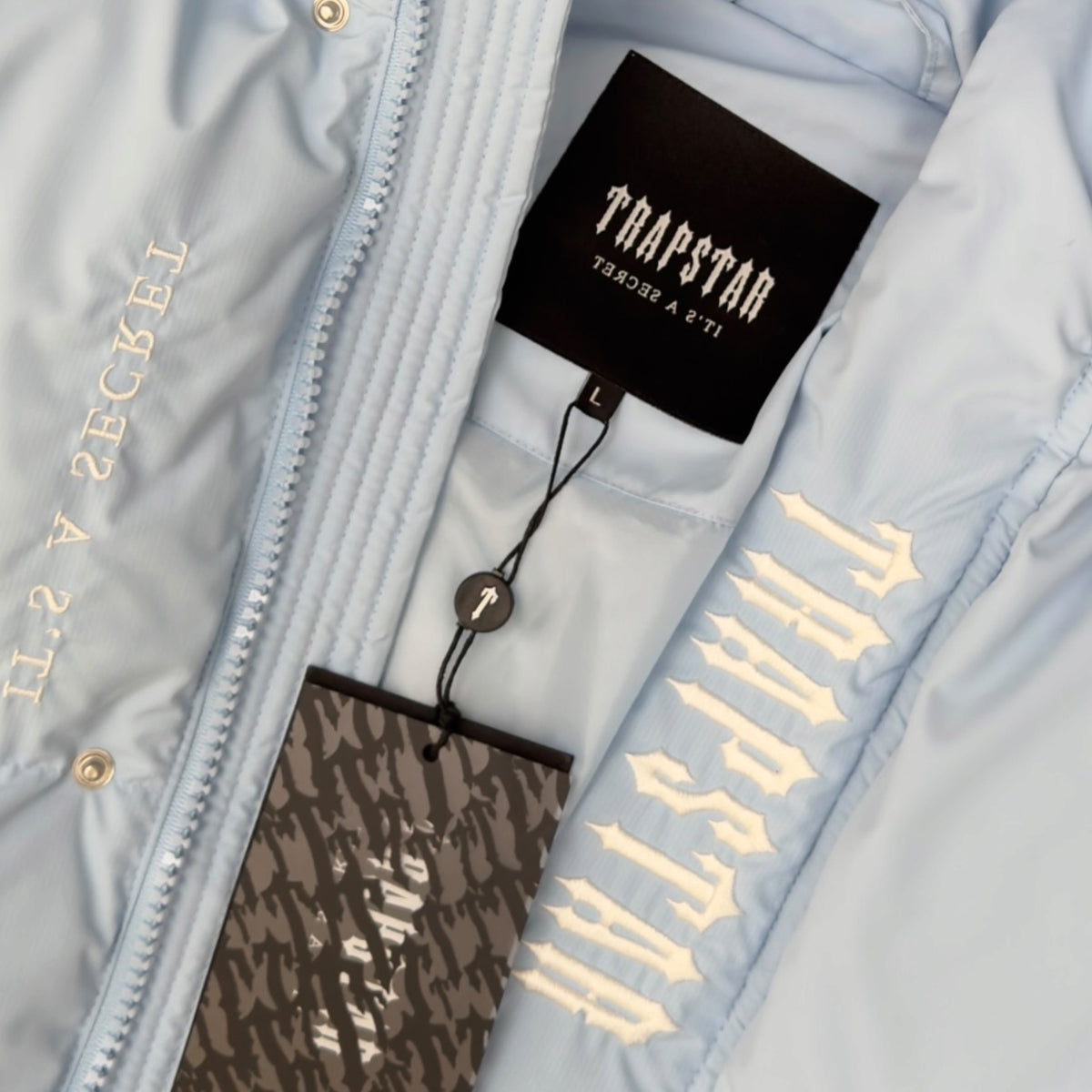 TRAPSTAR DECODED HOODED PUFFER JACKET ICE BLUE L