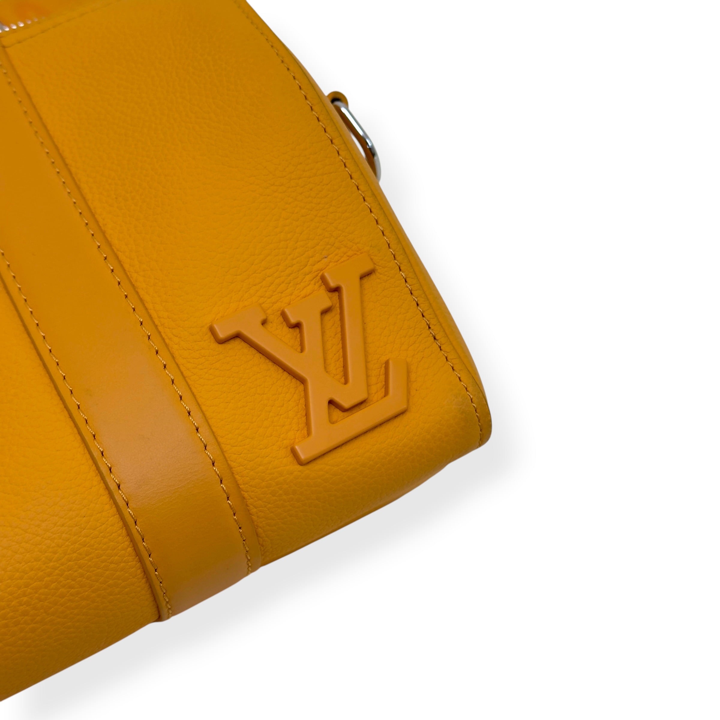 LOUIS VUITTON CITY KEEPALL AEROGRAM CROSSBODY BAG MUSTARD
