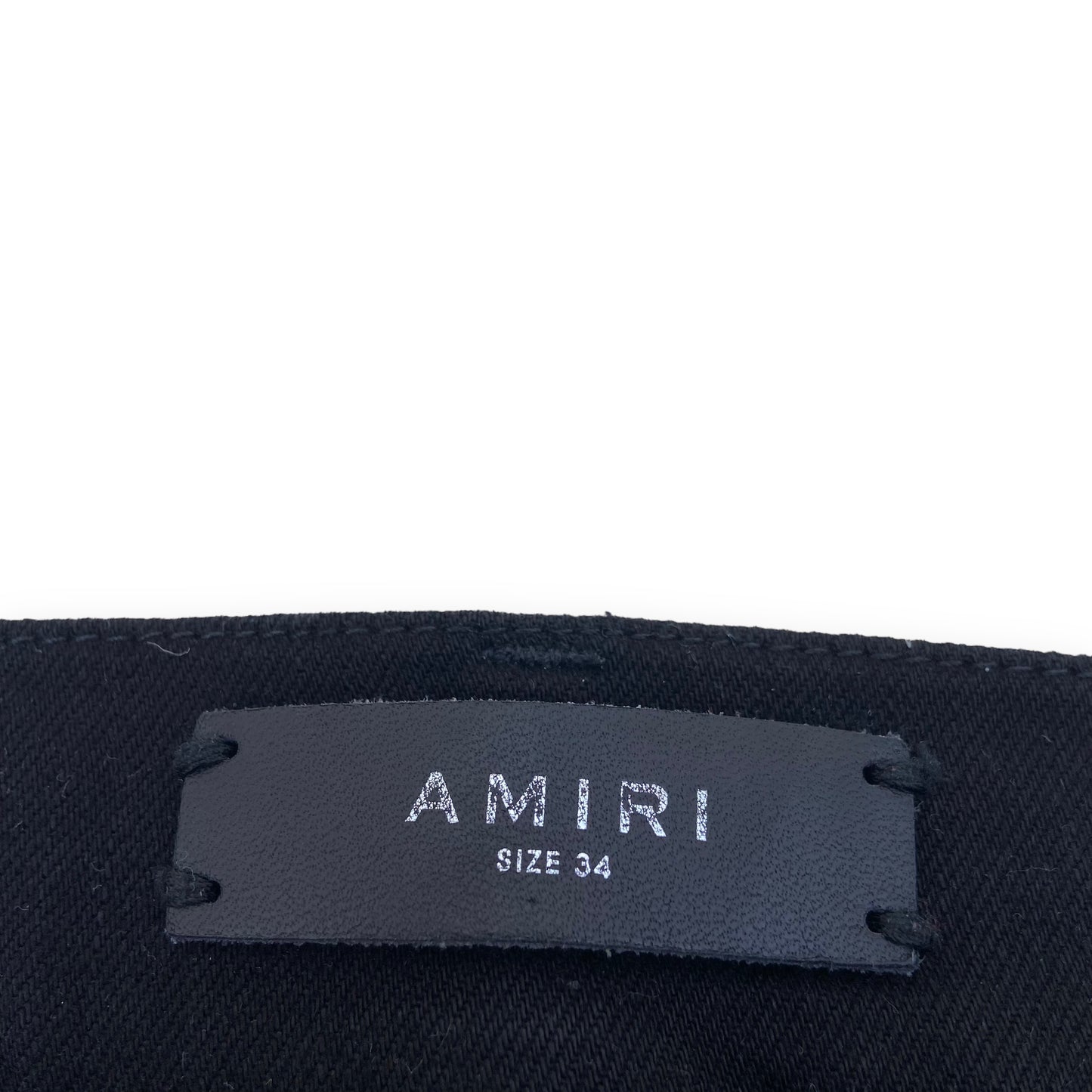 AMIRI LEATHER PATCH DISTRESSED DENIM JEANS BLACK 34W