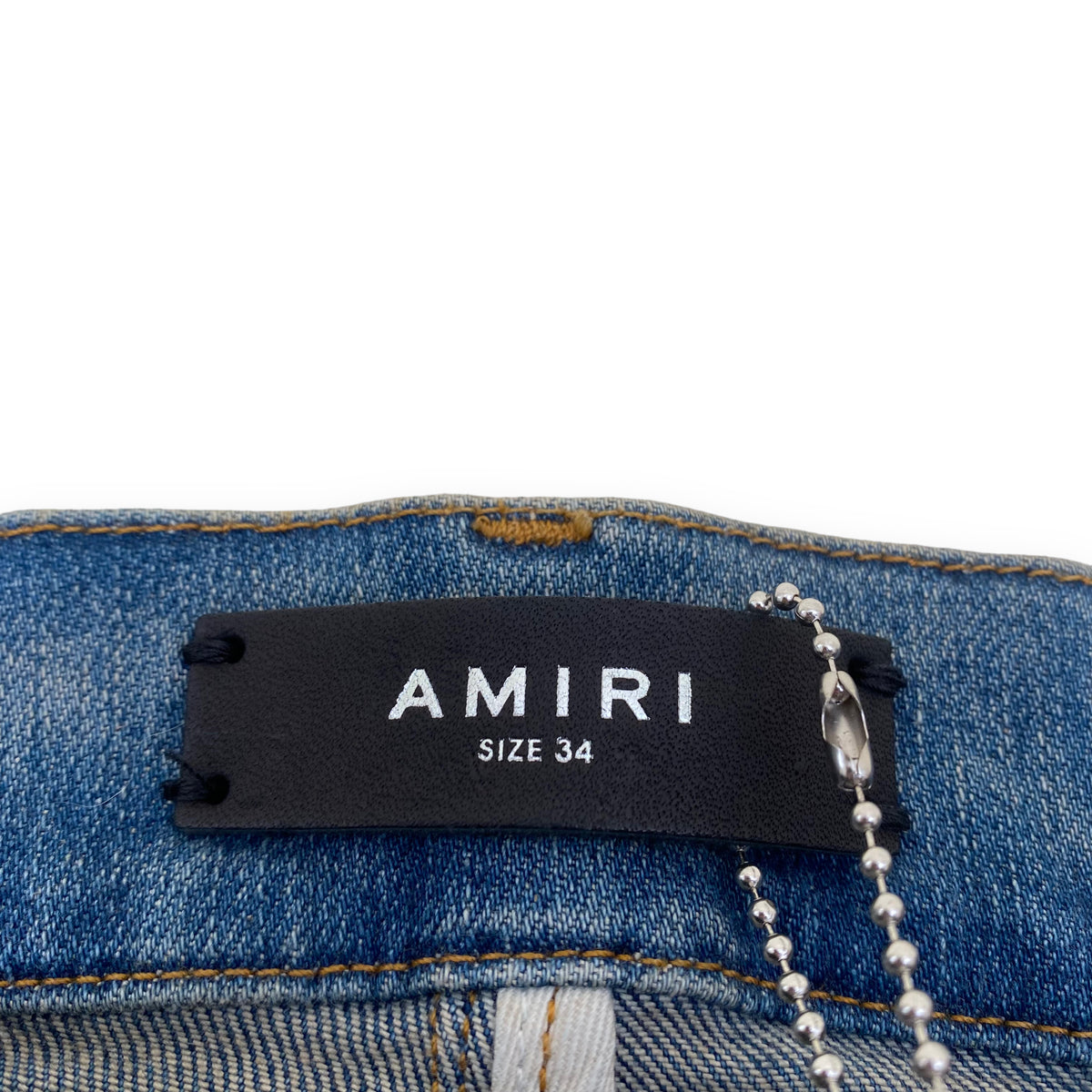 AMIRI PAINT SPLATTER FLARED JEANS BLUE 34W