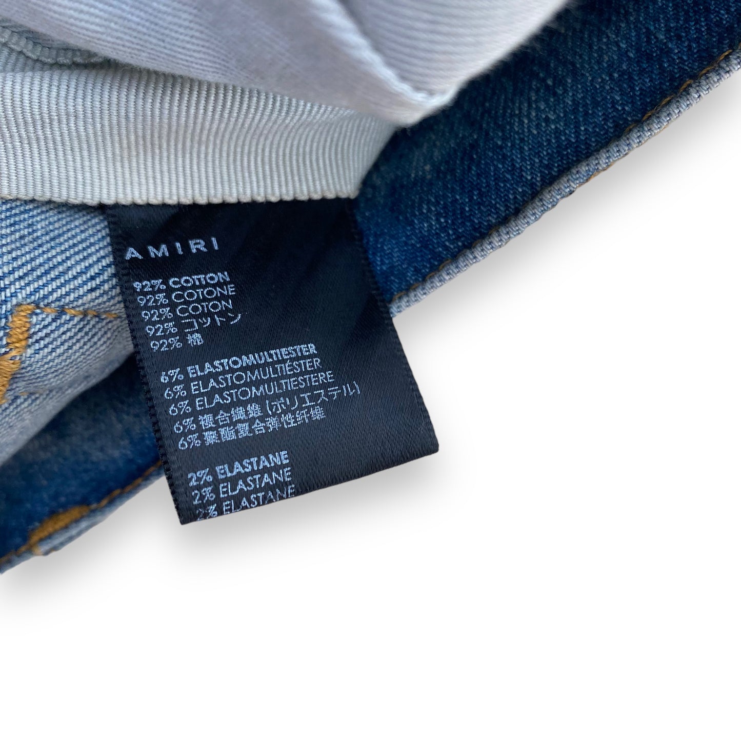 AMIRI PAINT SPLATTER FLARED JEANS BLUE 34W
