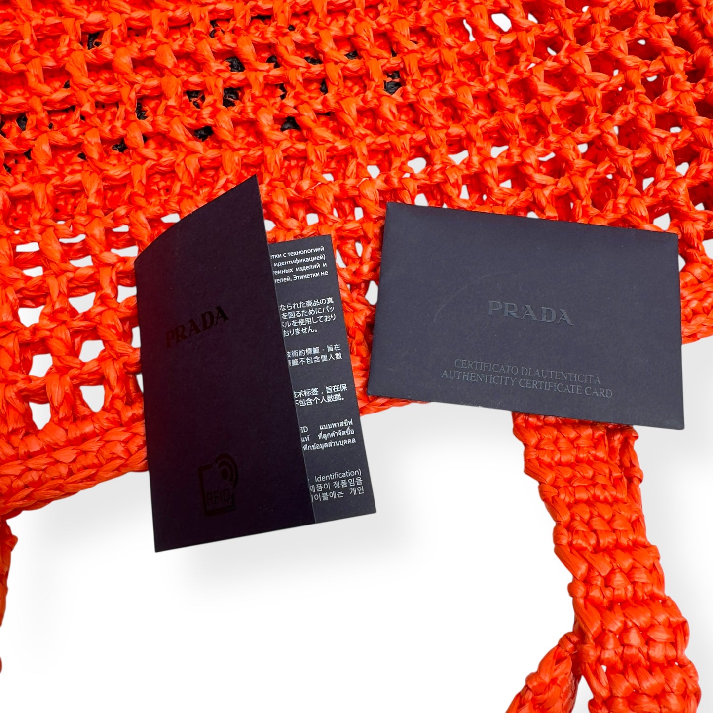 PRADA TRIANGLE-LOGO CROCHET RAFFIA TOTE BAG ORANGE / BLACK