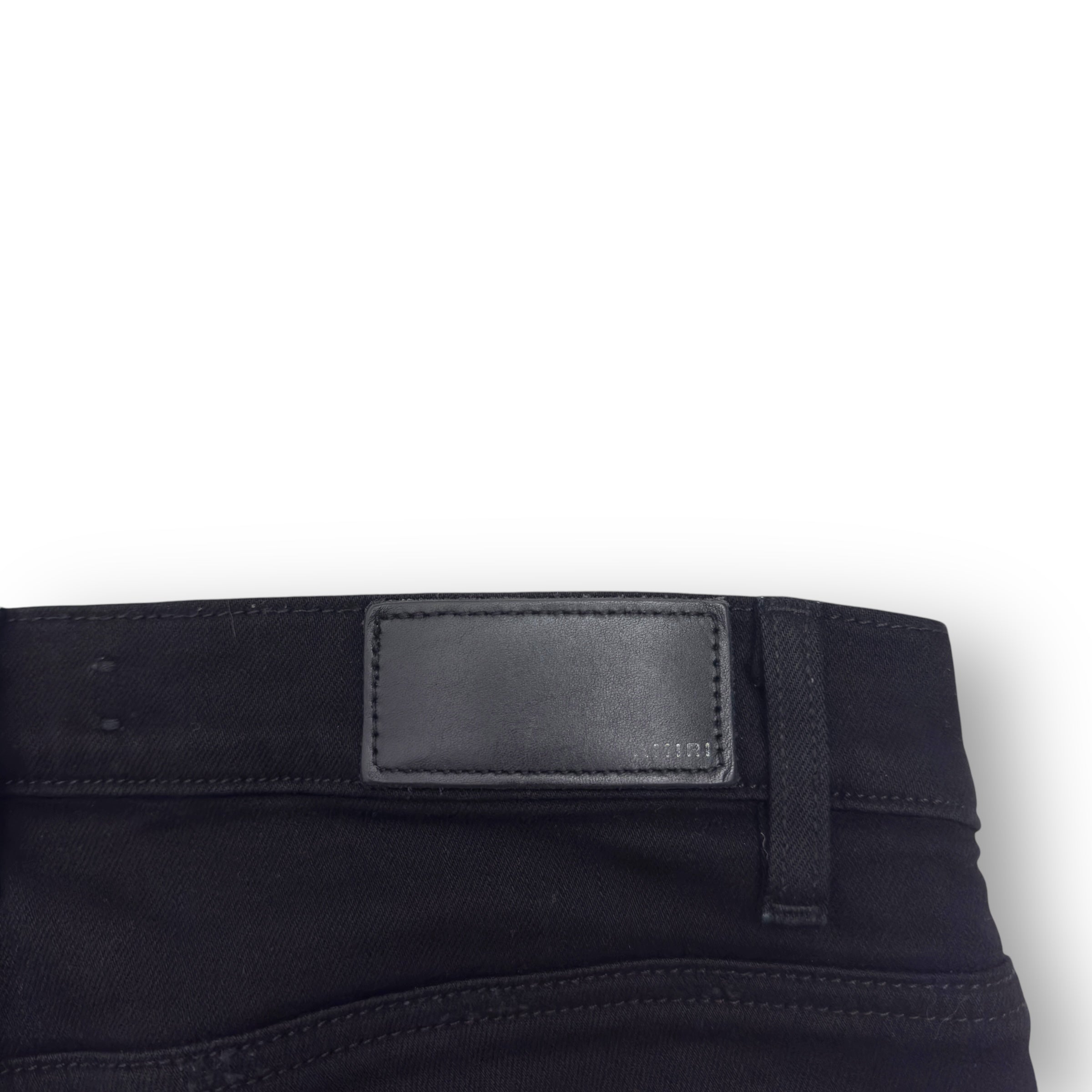 AMIRI MX1 SKINNY FIT LEATHER PATCH DENIM JEANS BLACK W32