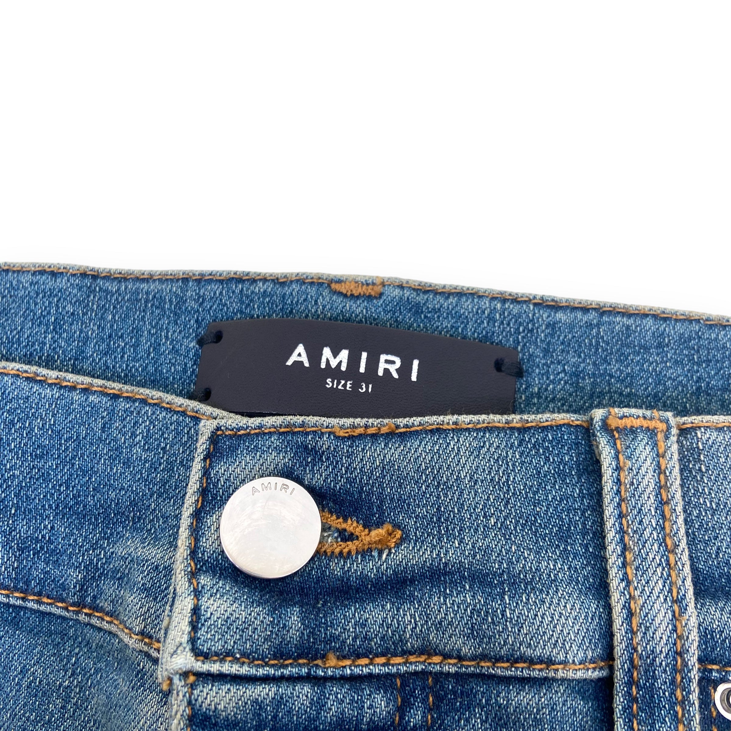 AMIRI DISTRESSED LEATHER PATCH DENIM JEANS BLUE 31W