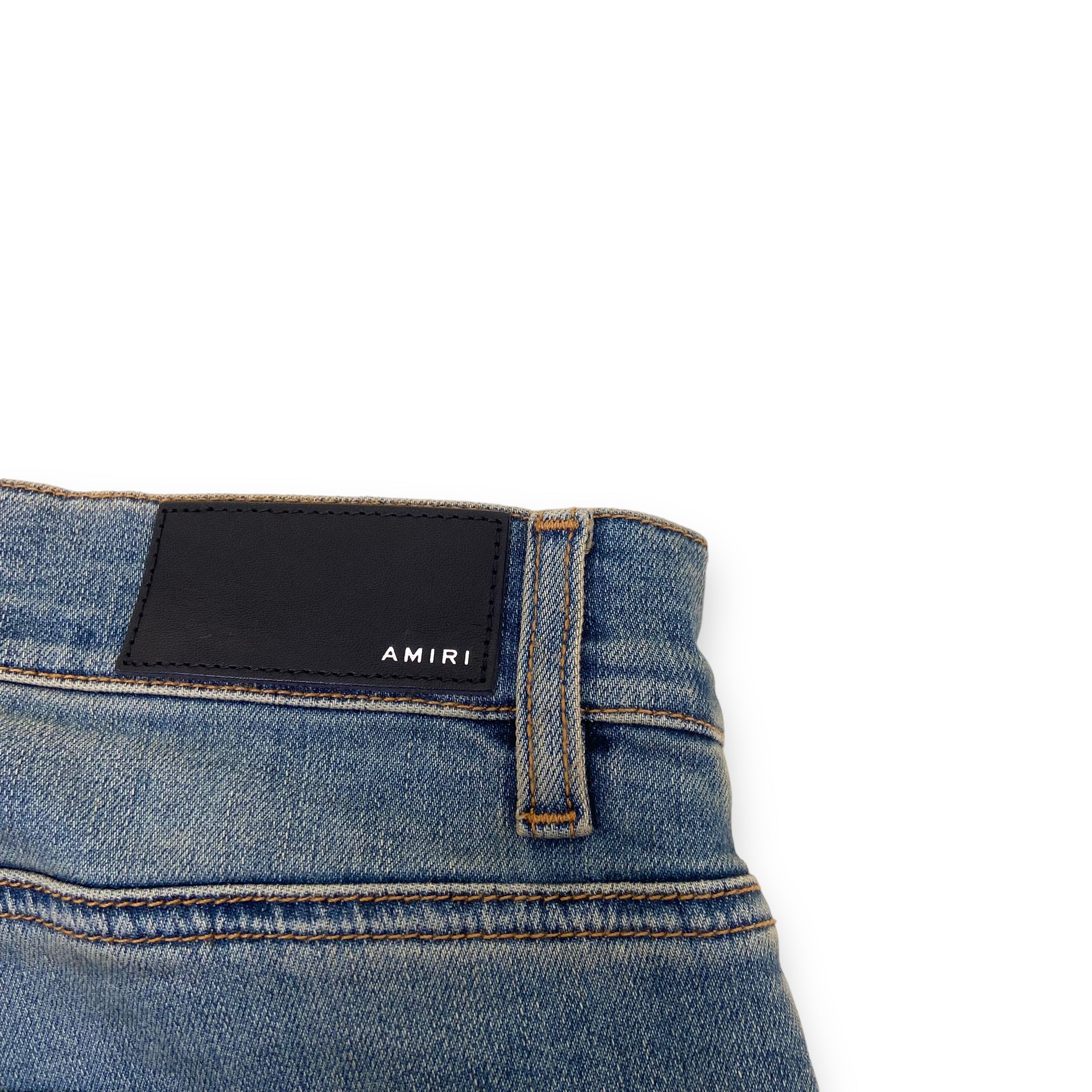 AMIRI DISTRESSED LEATHER PATCH DENIM JEANS BLUE 31W