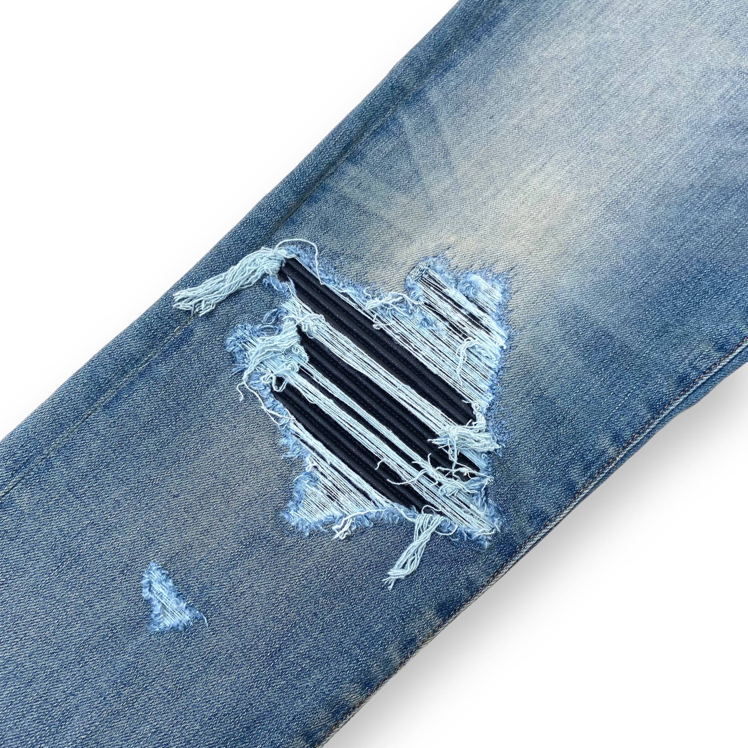 AMIRI DISTRESSED LEATHER PATCH DENIM JEANS BLUE 31W