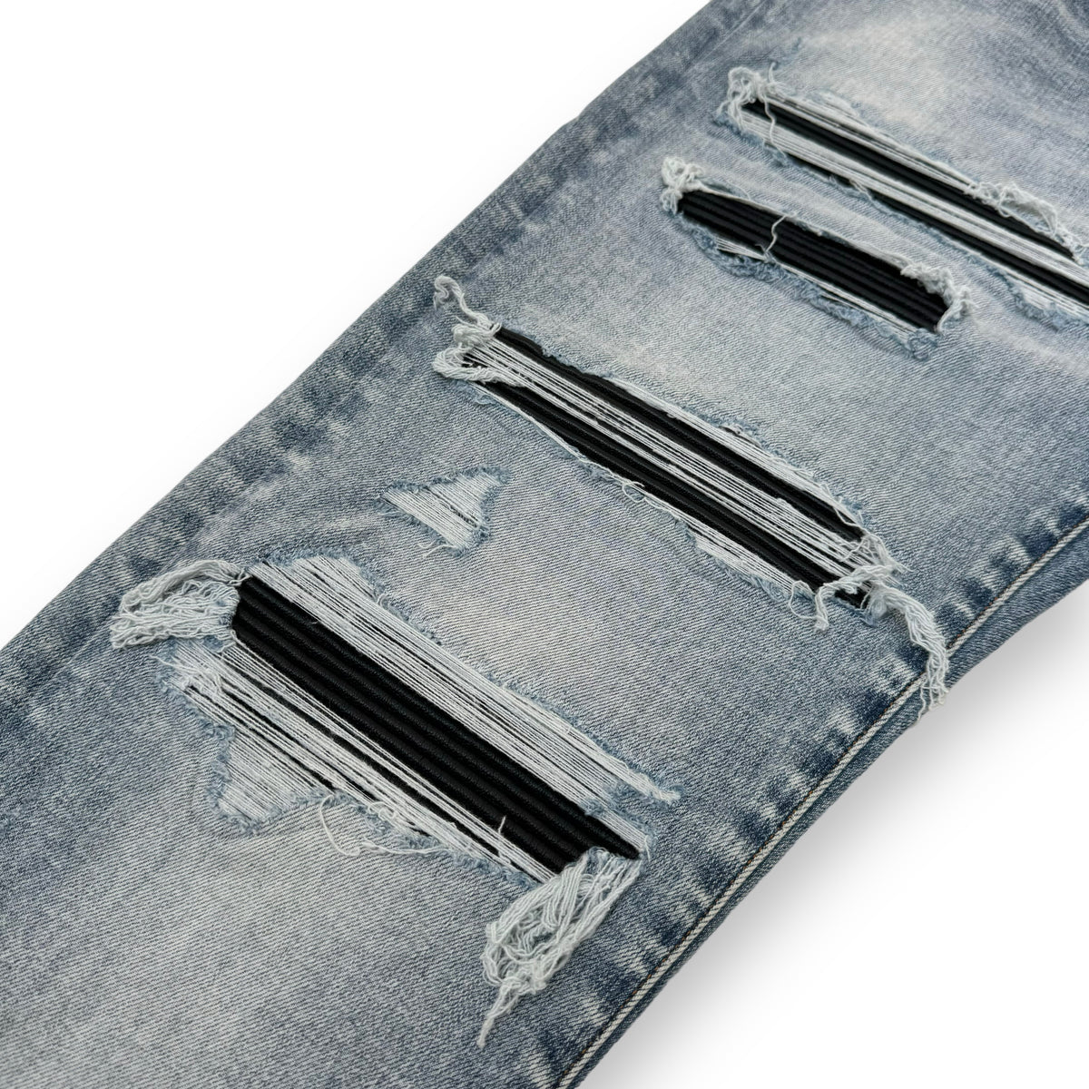 AMIRI DISTRESSED LEATHER PATCH WASHED DENIM JEANS BLUE 36W