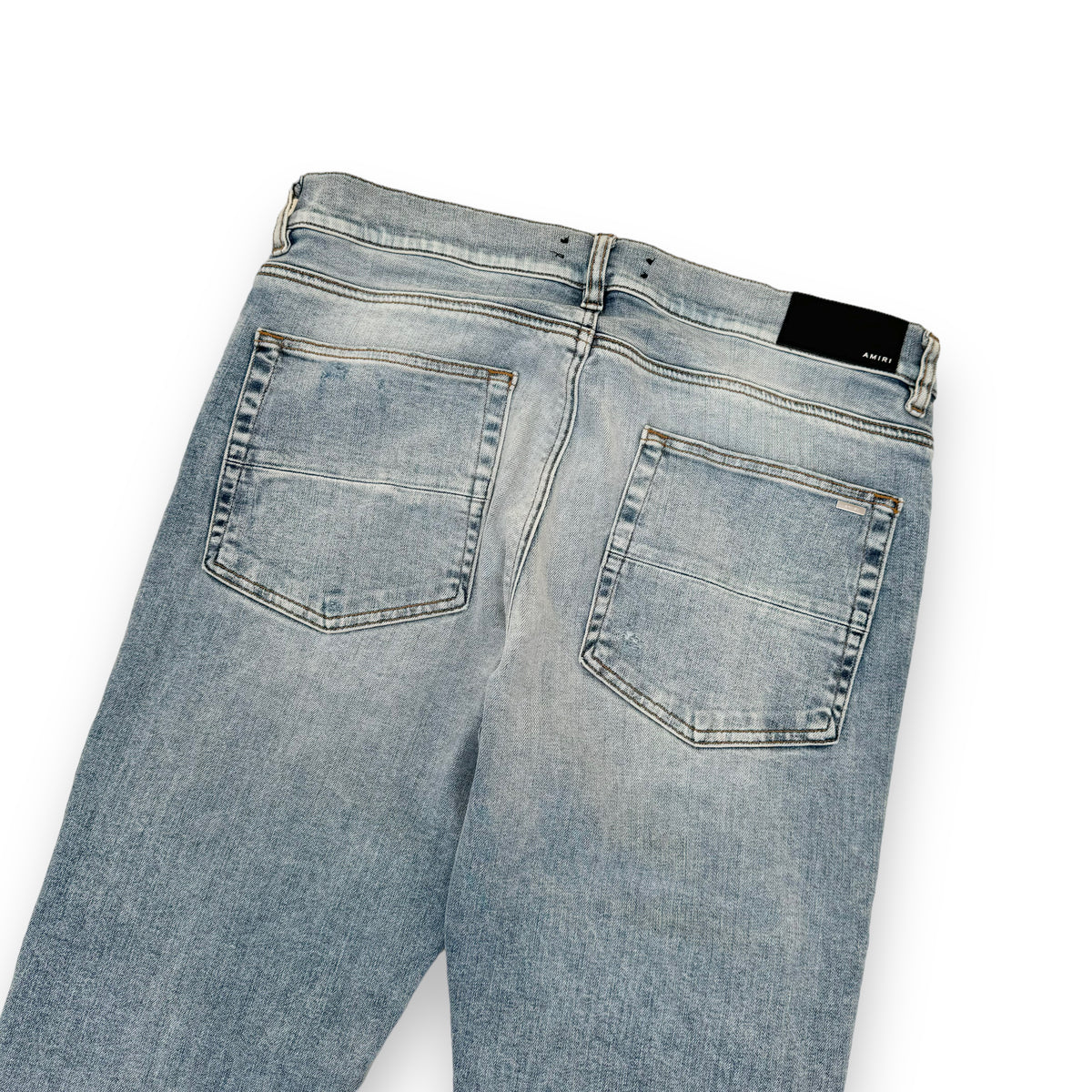 AMIRI DISTRESSED LEATHER PATCH WASHED DENIM JEANS BLUE 36W