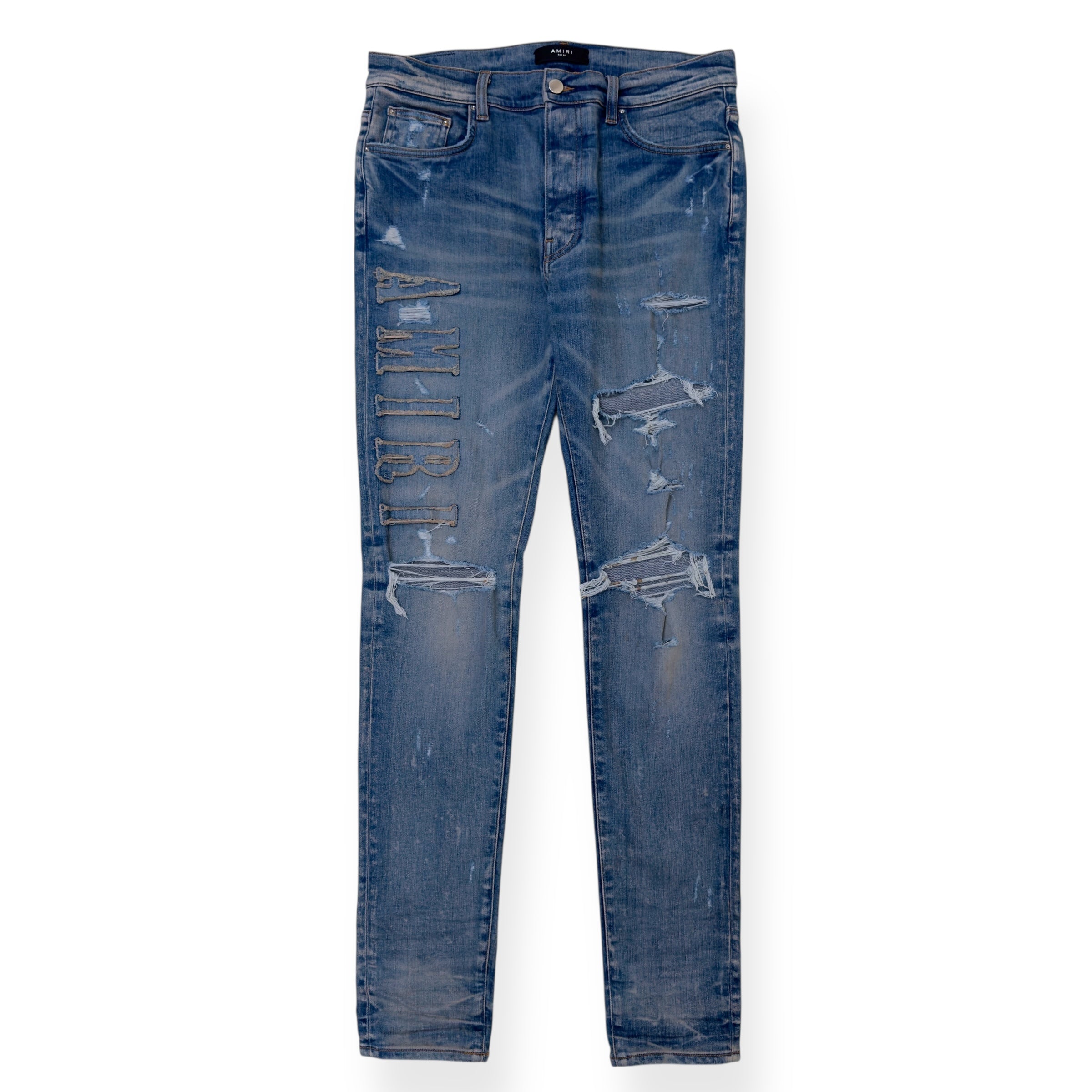 AMIRI LOGO APPLIQUE SKINNY DENIM JEANS INDIGO W34”