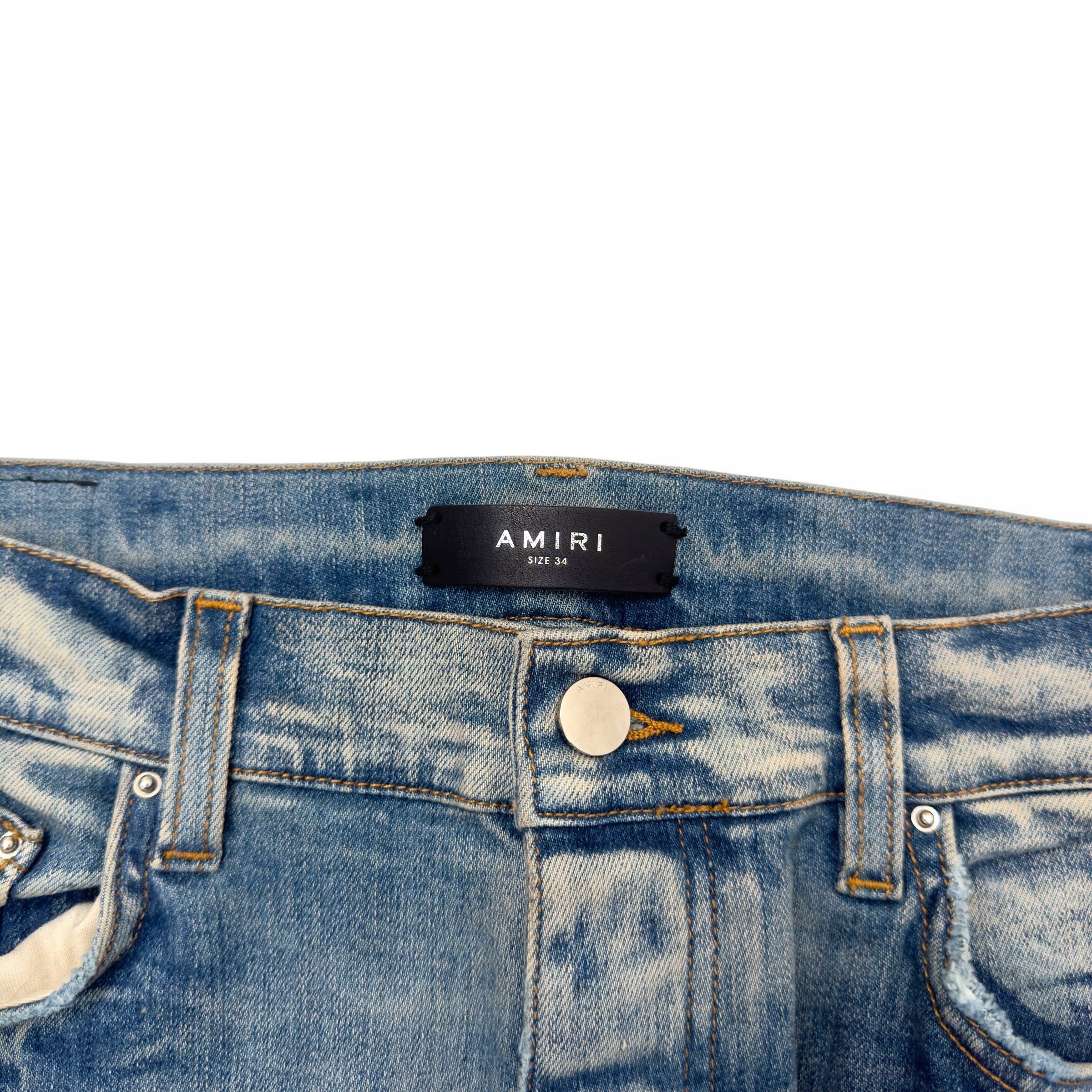 AMIRI VARSITY PATCH DISTRESSED SKINNY DENIM JEANS BLUE / BLACK W34”