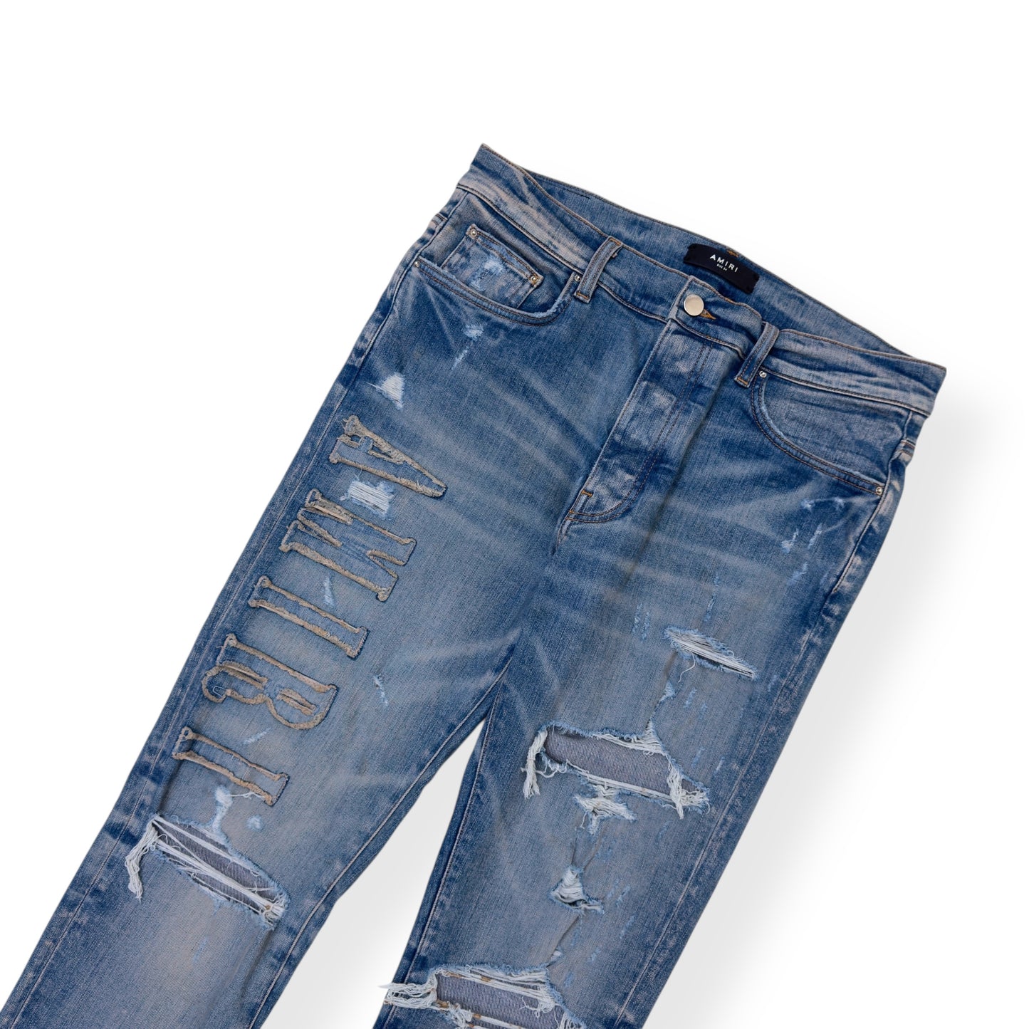 AMIRI LOGO APPLIQUE SKINNY DENIM JEANS INDIGO W34”