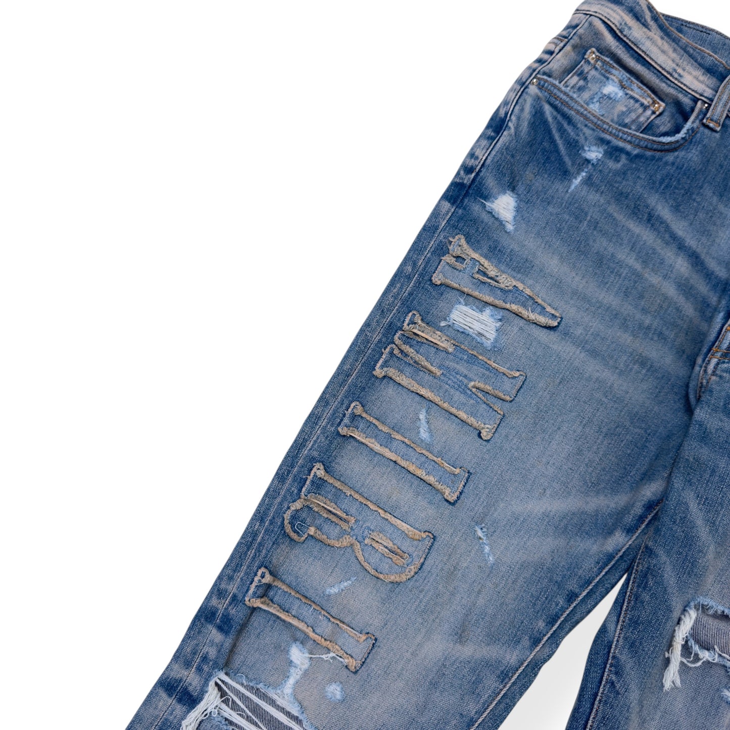 AMIRI LOGO APPLIQUE SKINNY DENIM JEANS INDIGO W34”