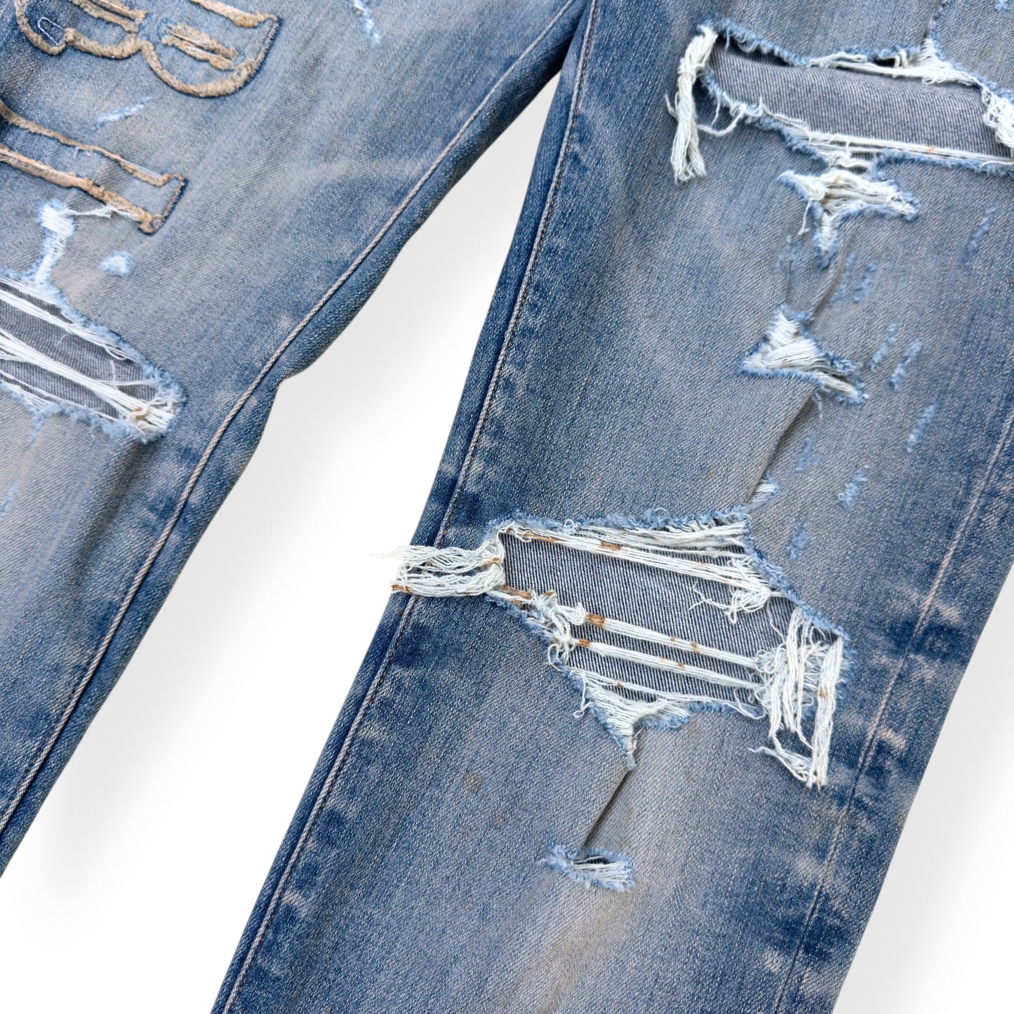 AMIRI LOGO APPLIQUE SKINNY DENIM JEANS INDIGO W34”