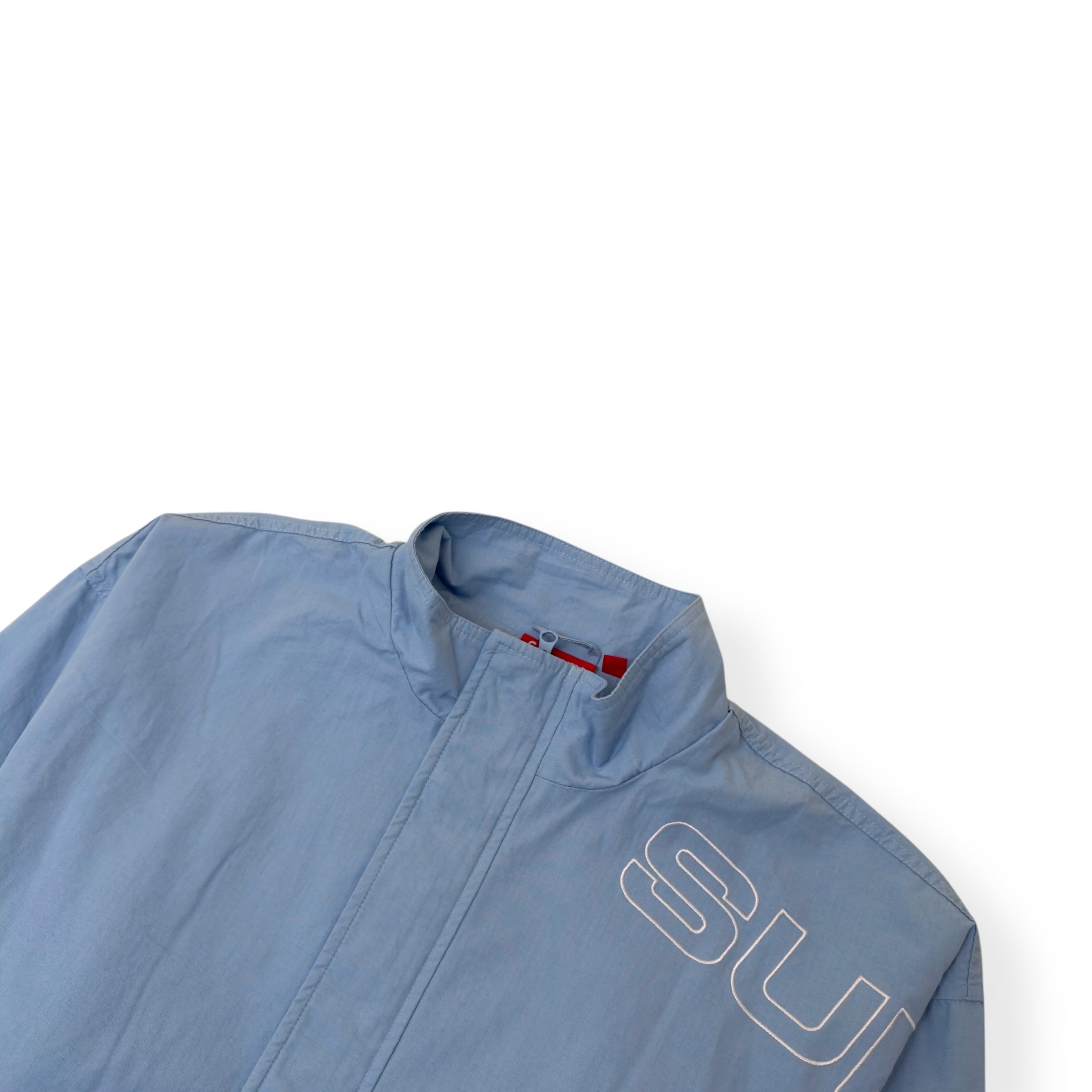SUPREME SPELLOUT EMBROIDERED RIPSTOP TRACK JACKET BABY BLUE XL