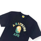 A BATHING APE TIE DYE COLLEGE T-SHIRT BLACK / GREEN XL
