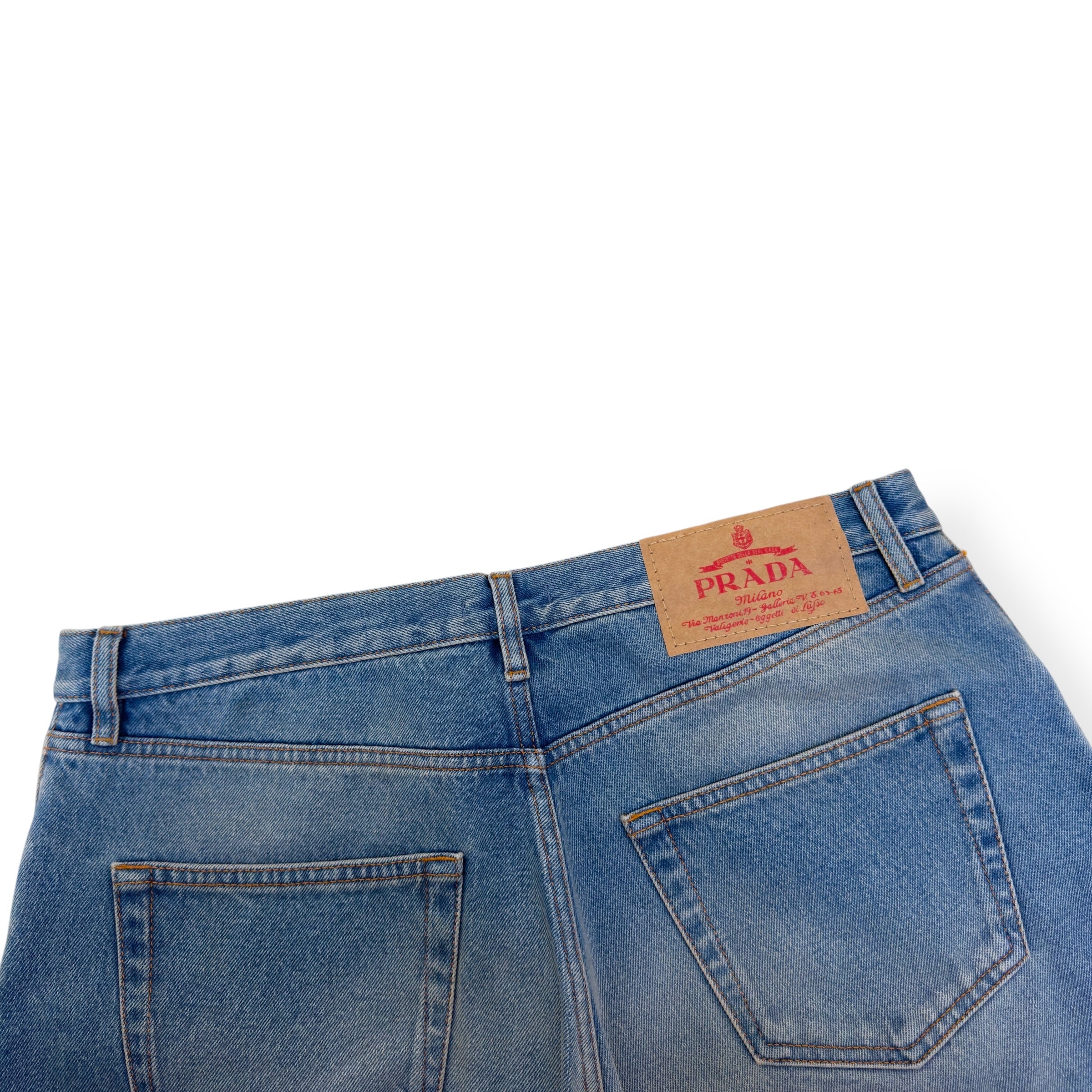 PRADA PLAQUE-LOGO WASHED DENIM JEANS BLUE W34”