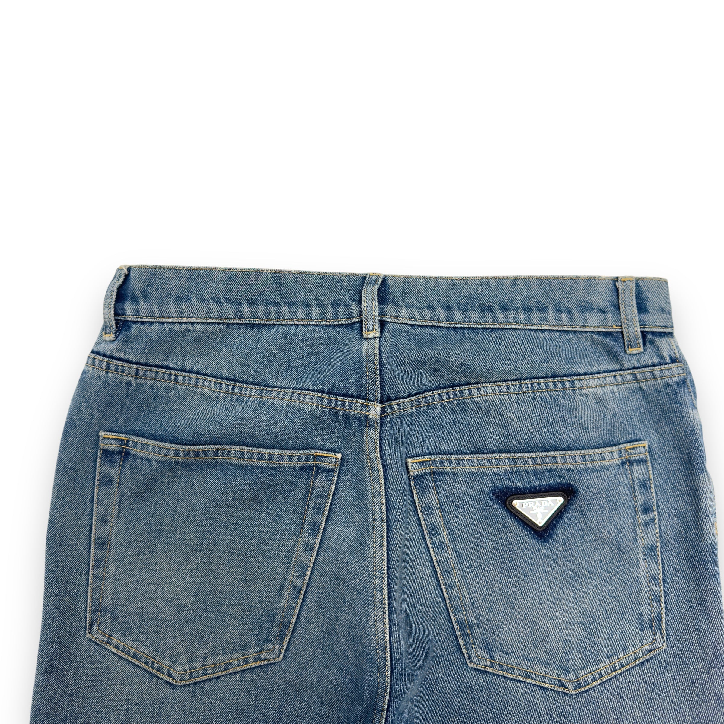 PRADA TRAINGLE-LOGO PLAQUE DISTRESSED DENIM JEANS BLUE W32”
