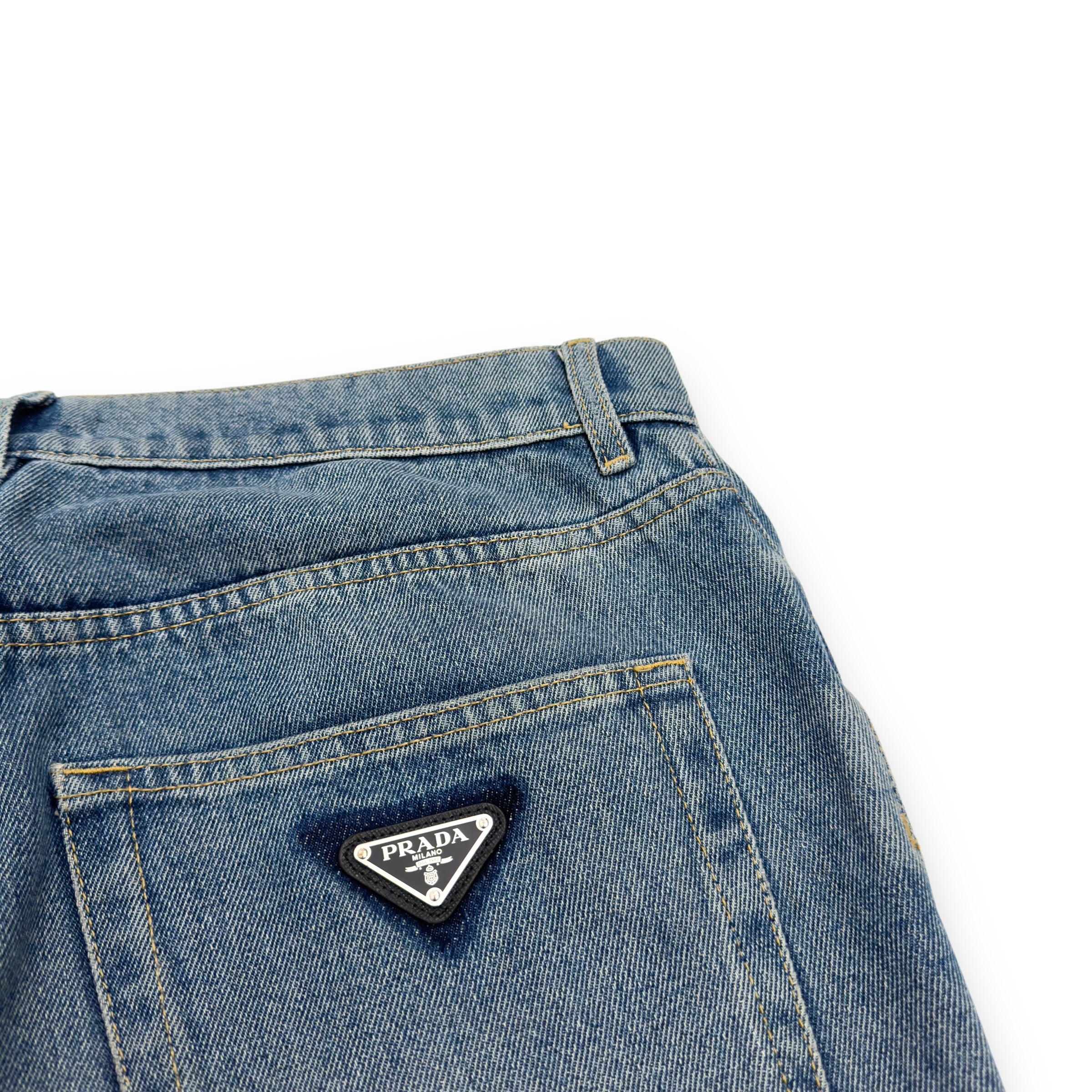 PRADA TRAINGLE-LOGO PLAQUE DISTRESSED DENIM JEANS BLUE W32”