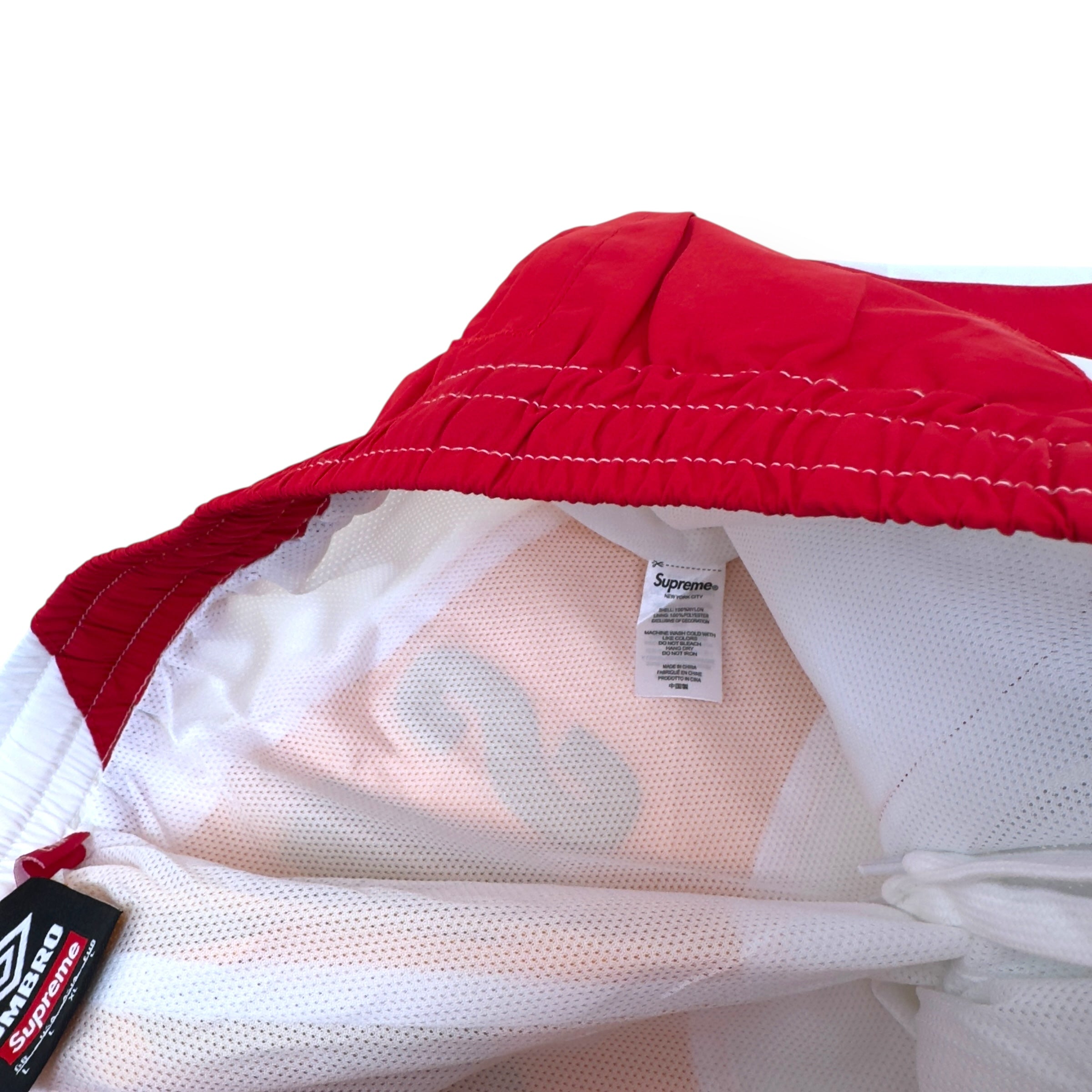 SUPREME X UMBRO TRACK PANTS WHITE / RED L