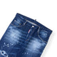 DSQUARED2 PAINT SPLATTER DISTRESSED SLIM DENIM JEANS 50 / L