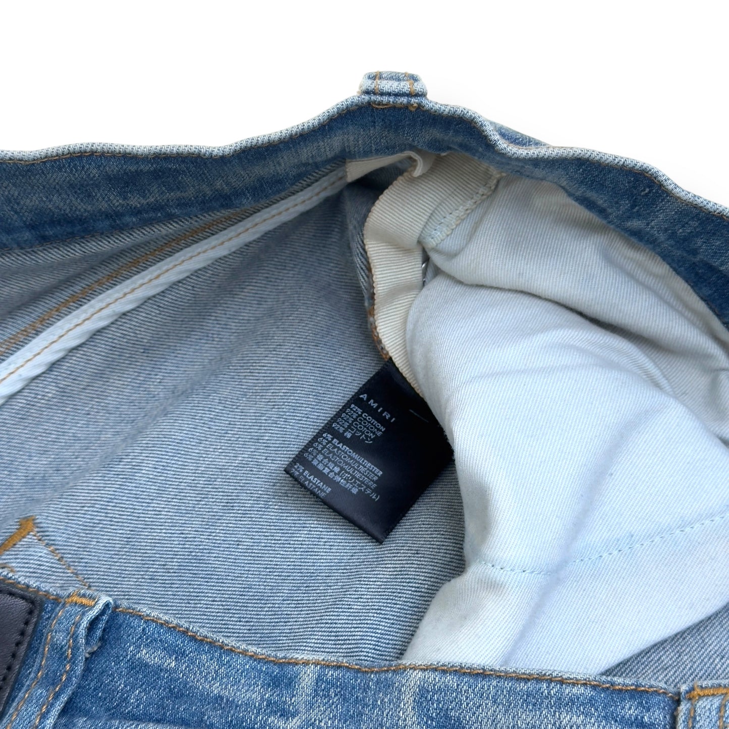 AMIRI PAINT SPLATTER FLARED DENIM JEANS BLUE W32”